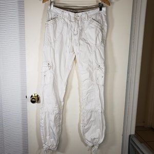 Women's white cargo pants with functional pockets